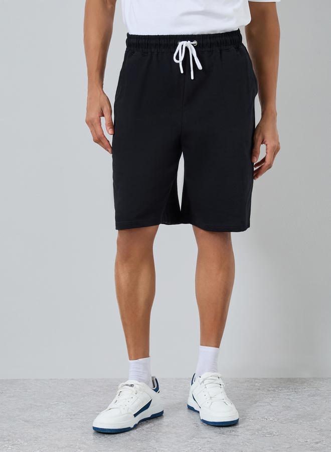 ستايلي طقم تيشيرت واسع بطبعة بسيطة وشورت - Image 3